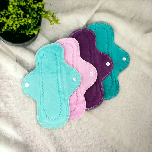 Paquete 4 toallas flujo regular 26cms aqua mora algodón