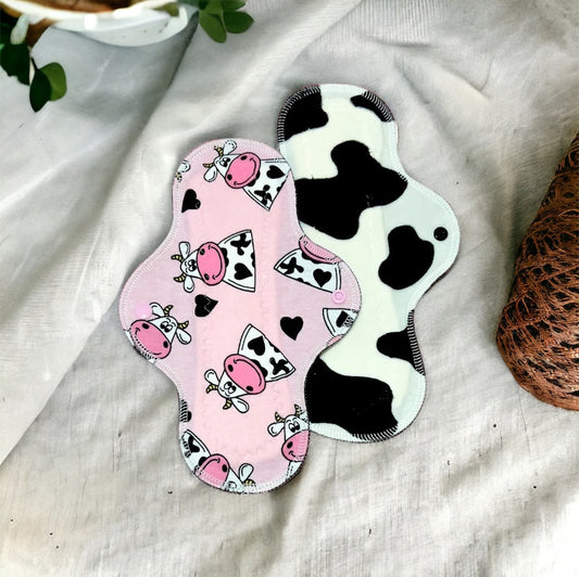 Duo de prueba vaquita minky con toalla regular y abundante