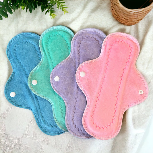 Paquete 4 toallas flujo regular 26cms algodón de azúcar minky